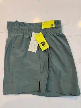 Women's Athletic Shorts size M in Sage Green Mid rise Quick dry stretch UPF 50+